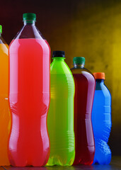 Plastic bottles of assorted carbonated soft drinks