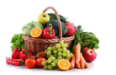 Fototapeta na wymiar Fresh organic fruits and vegetables in wicker basket