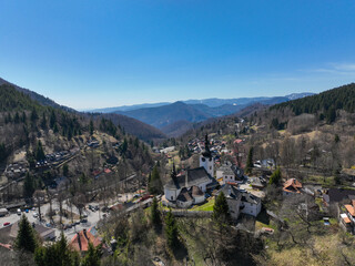 Fototapeta na wymiar Aerial view of the church in the village of Spania Dolina in Slovakia