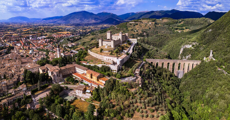 Heritage of Italy and  ancient landmarks of Umbria . impressive Spoleto town aerial view of castle...