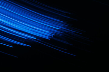 Defocused neon light. Fluorescent rays. Sci-Fi radiance. Blur UV navy blue color glowing streak...