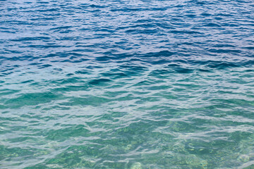 Seascape of clear water on the sea. Clear water on the ocean, sea or lake. Water ripples in the sun.