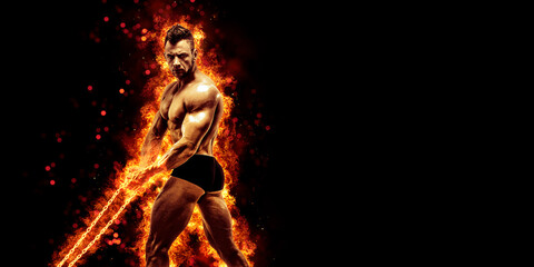 Fototapeta premium Body builder with fit torso belly chest and arms biceps triceps muscles holding chain while posing over the black background with fire. Bodybuilding concept 
