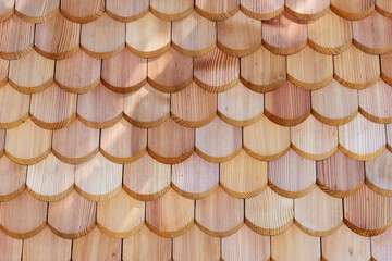 New half-round wooden shingles for roof or wall cladding