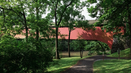 Red Covered Bridge Over Water