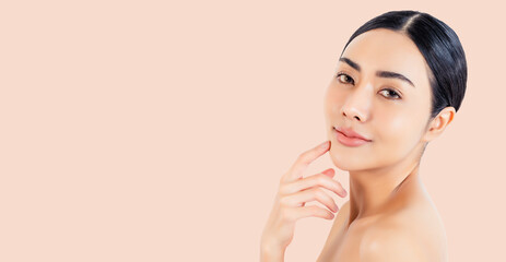 Young Asian woman touching beauty facial skin Close up face beauty Healthy skin natural make up...