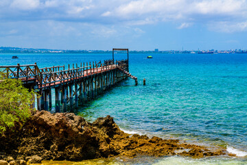 Fototapeta na wymiar Old wooden pier at the Prison island. Zanzibar, Tanzania