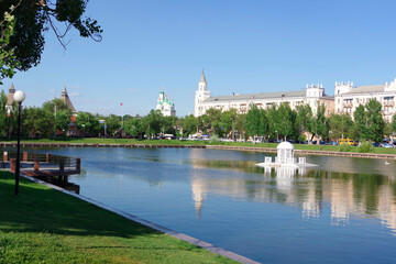 Fototapeta na wymiar City of Astrakhan, 07.05.22. View of the swan lake in the city center.