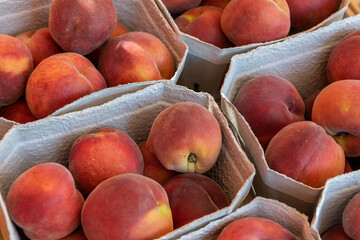 Healthy organic peach at a roadside street market