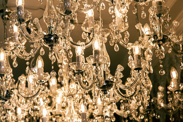 Close-up, old vintage chandelier with many details.