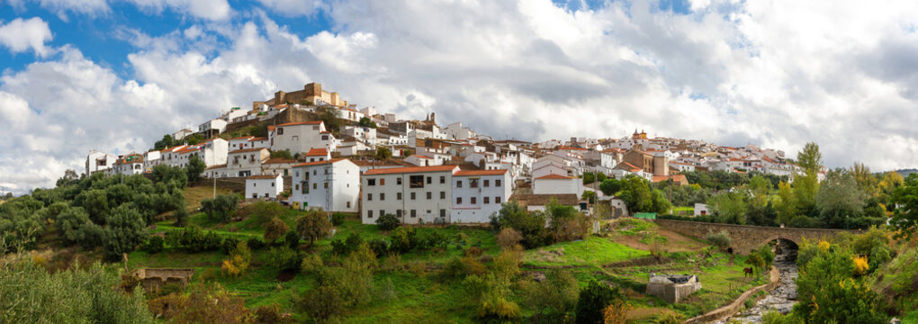 Panoramic view of the town of Aroche with its white houses in Andalusia, Huelva, Spain