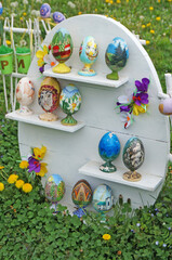 Easter eggs decorated and decorated with colorful ribbons are displayed in the park for the holidays