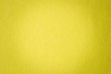 Yellow color felt textile fabric texture background