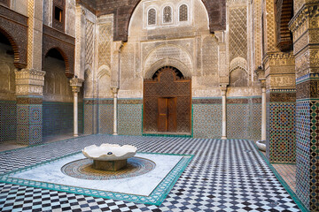 Ancient islamic interior in Morocco used for schooling and prayers. - 517536364