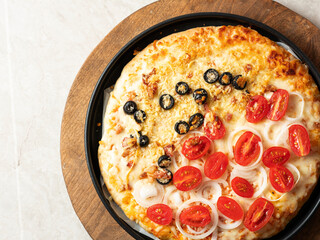 pizza on a wooden board