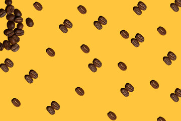 roasted coffee beans on yellow background pattern