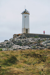 Fototapeta na wymiar lighthouse on the coast