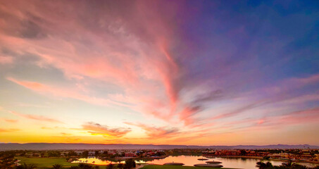 The Colorful Sky at Sunset - Showing the amazing colors of the sky at the sunset of pink, purple, pink, red & orange in Gouna, Egypt