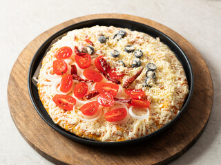 pizza with tomatoes and olives