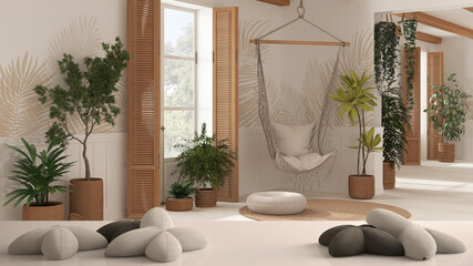 White table, desk or shelf with five soft white pillows in the shape of stars or flowers, over cuntry living room with rattan lace hanging chair, white architecture interior design
