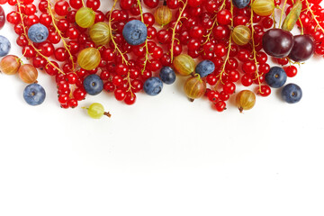 Various fresh summer berries frame on white background. Top view