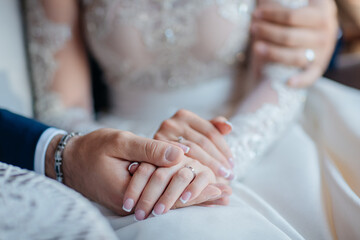 hands of bride and groom