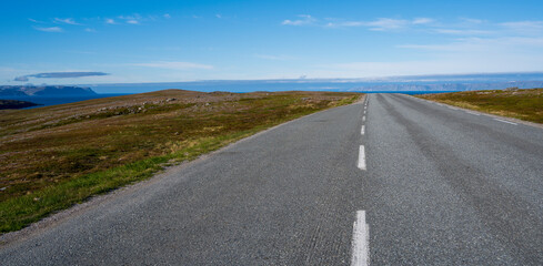 Asphalt road in tundra
