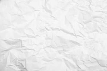 Sheet of white crumpled paper as background, closeup