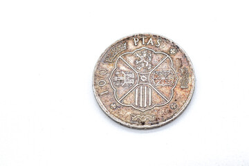 one hundred spanish old coins on white background