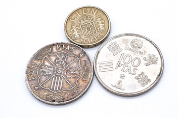 pesetas spanish old coins on white background