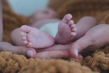 baby feet in bed