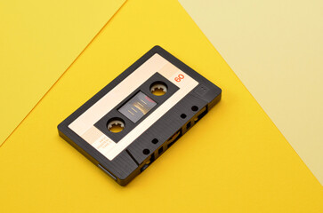 cassette for listening to music on a yellow background