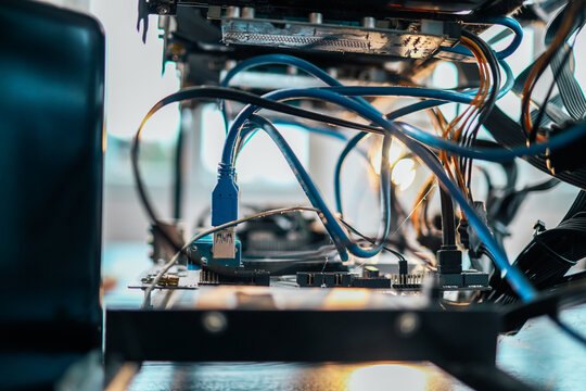 Cryptocurrency minig rig witc cables and USB ports