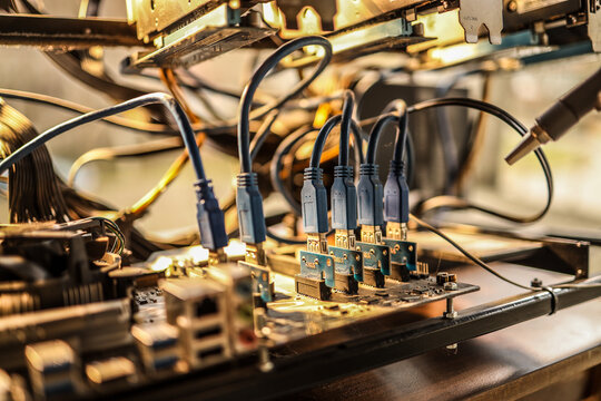 Cryptocurrency minig rig witc cables and USB ports