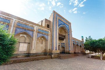 Fototapeta na wymiar Exterior of the Kutlug-Murad Inaka Madrasah in Khiva, Uzbekistan, Central Asia