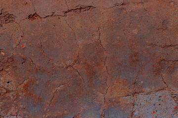 Multicolored rusty texture of the wall for background.