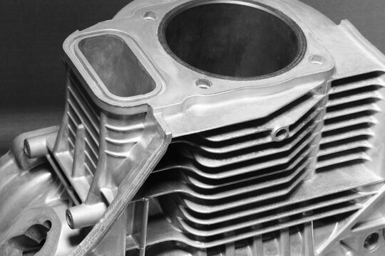 Open block cylinder petrol engine. Close-up, industrial metalworking concept