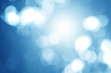 Obraz premium Light blue Leaf background. Blurred leaves and circular bokeh. Abstract wallpaper for backdrop and design