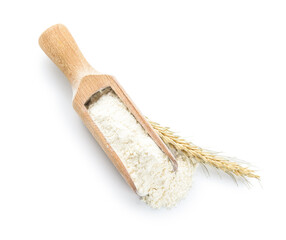 Scoop with flour and wheat ear on white background