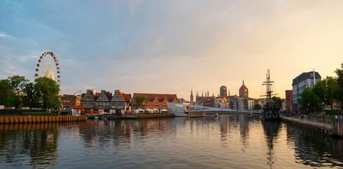 Obraz premium Scenic summer evening panorama of the architectural embankment pier twilight sunset of the Old Town of GDANSK, POLAND