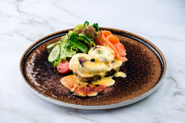 Toast with salmon, poached egg and avocado Poached egg with salmon