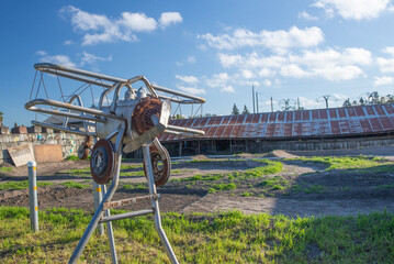 Small plane made by scraps of metal and other scrap garbage  parts.on wasteland