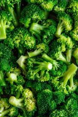 Macro photo green fresh vegetable broccoli. Fresh green broccoli on a black stone table.Broccoli...