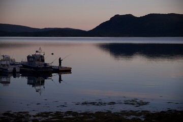 Fishing in sunrise in Norway
