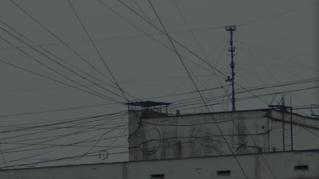 Cityscape, building in wires during a thunderstorm 
