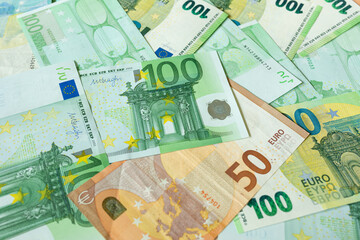 Obraz na płótnie Canvas Money background. Euro banknotes in denominations of 50 and 100. The currency of the European Union