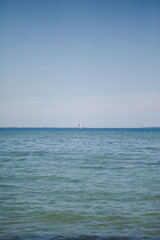 Fototapeta na wymiar Sailboats on Lake Ontario in Canada. Presquile Provincial Park and Conservation Area.