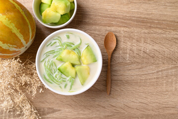Thai dessert (Lod Chong), Rice flour jelly pandan flavor with Thai melon in coconut milk  - obrazy, fototapety, plakaty