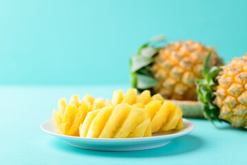 Sliced pineapple fruit ready to eating on color background, Tropical fruit in summer season