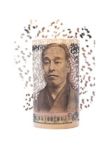 Japanese yen bill breaking into pieces. The concept of currency devaluation and economic crisis.